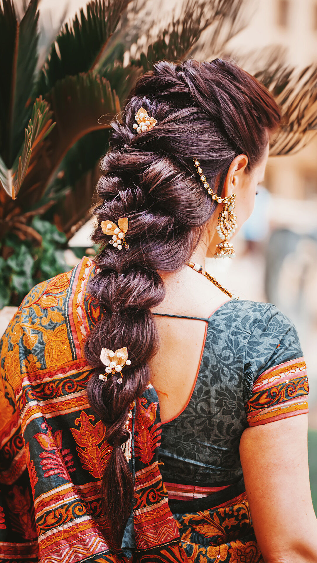Bride with braided hairstyle on her wedding day